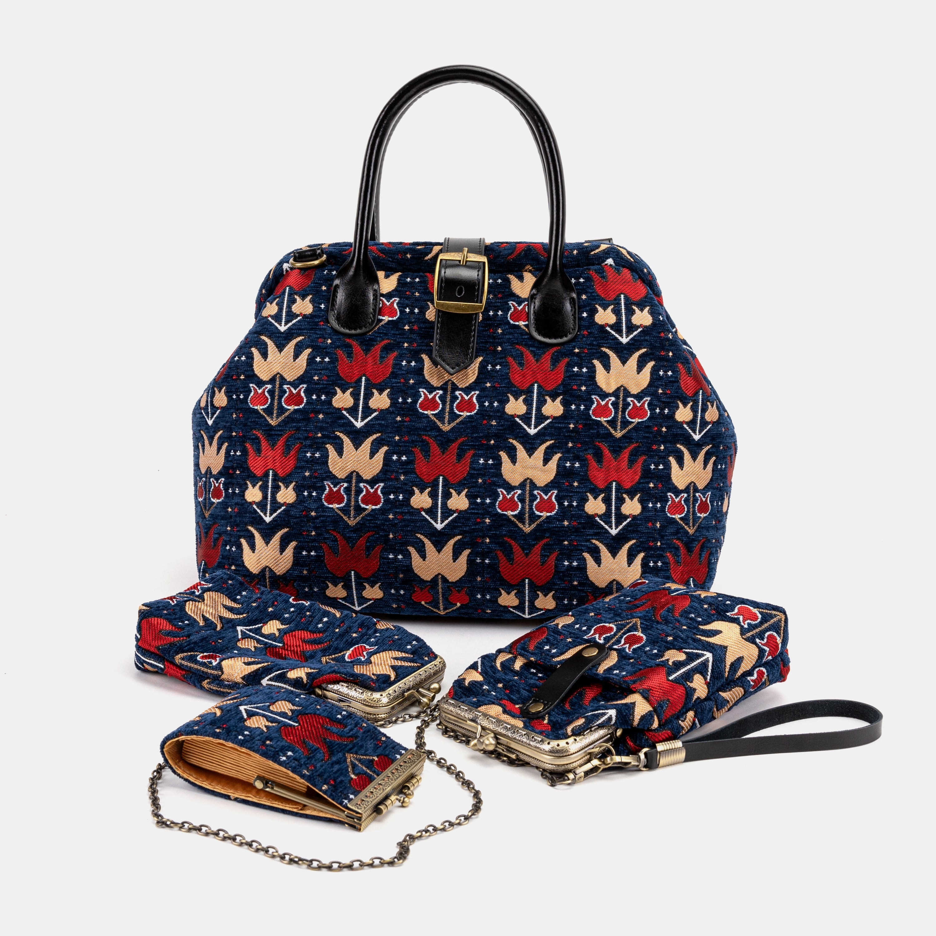 Poppy Bloom Carpet Bag combines the iconic, sturdy design of a classic carpet bag with the vibrant and romantic energy of our exclusive floral print