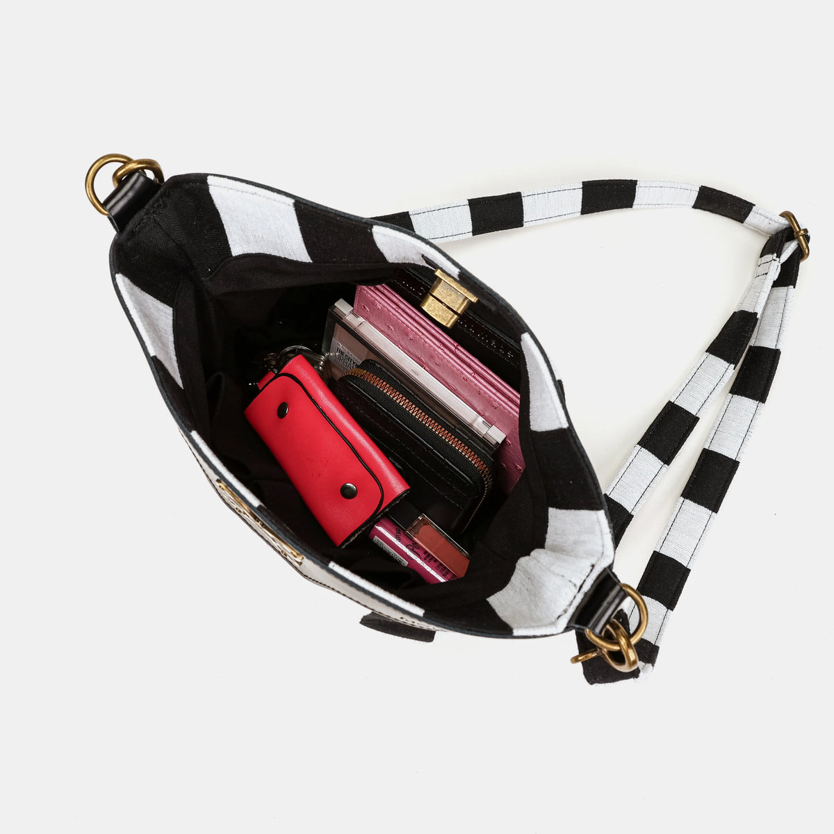 Black & White Beetlejuice Crossbody Carpet Bag of America in use