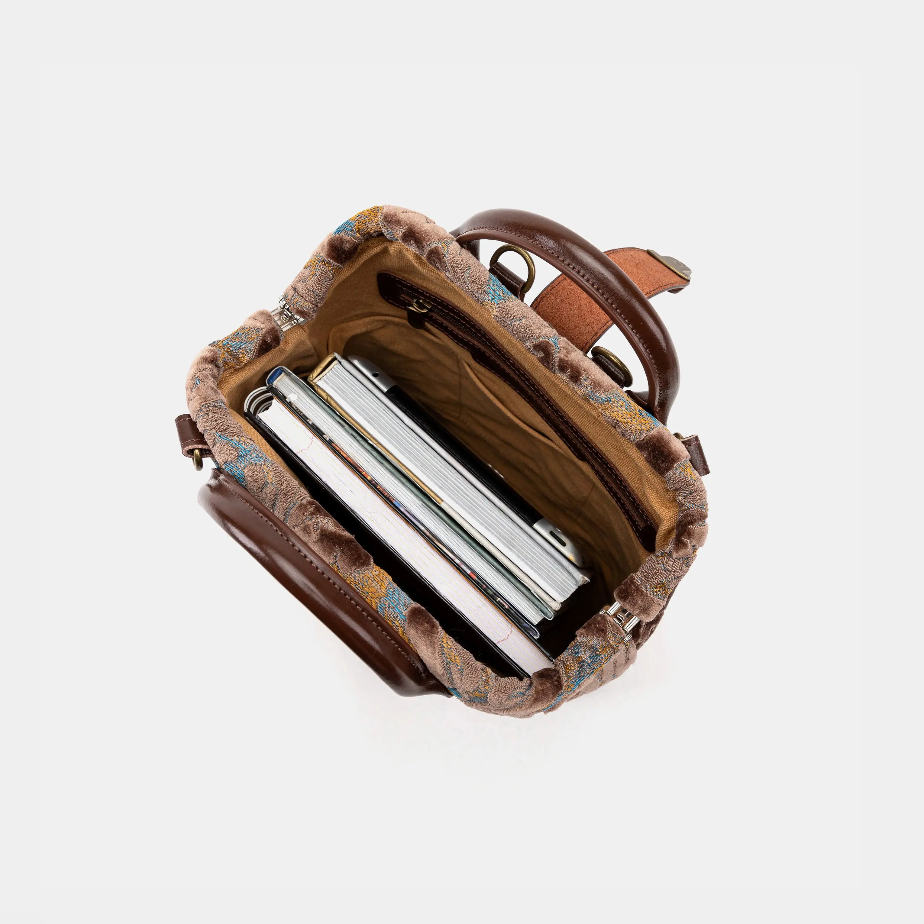 Burnout Velvet Camel Everyday Backpack of America in use
