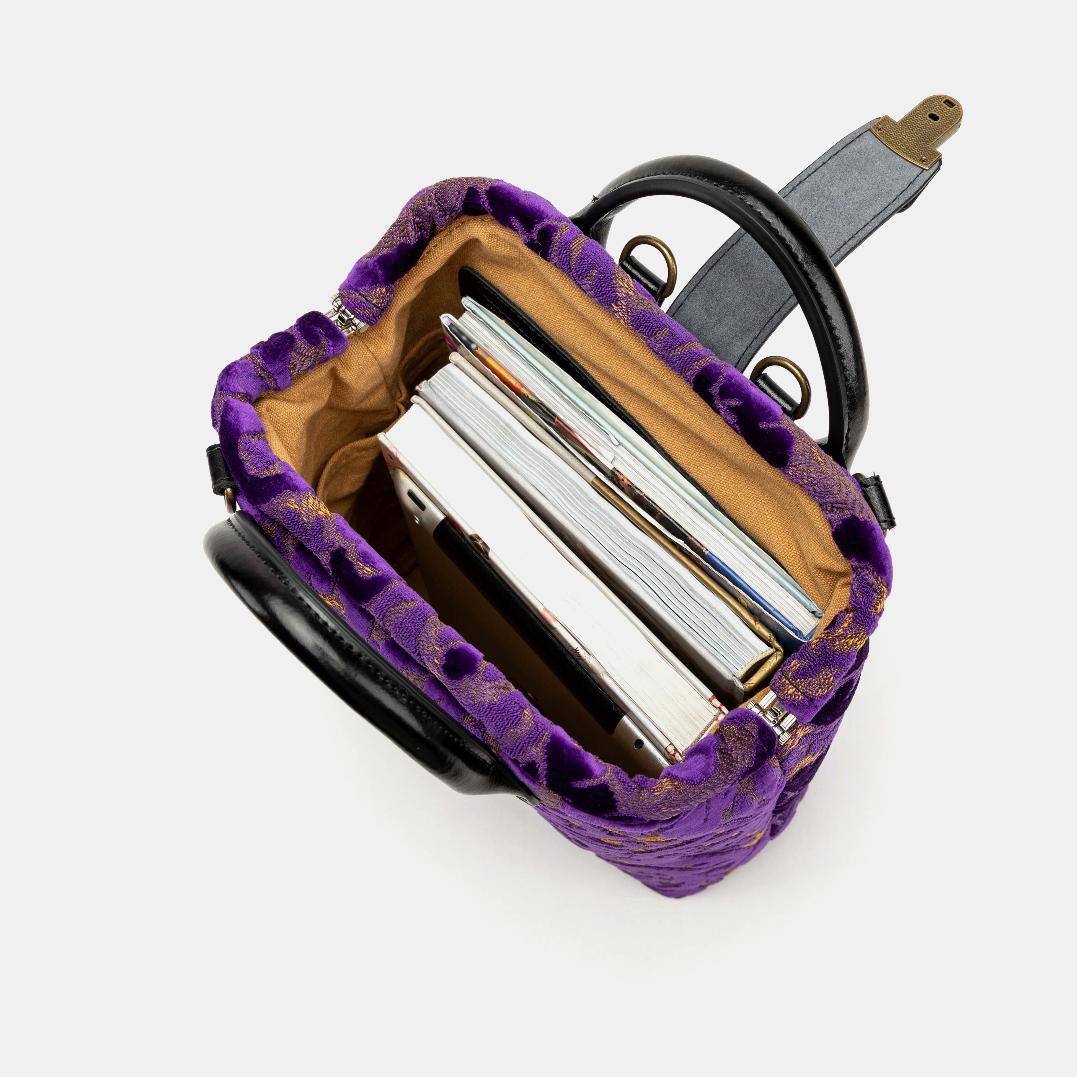Burnout Velvet Purple Everyday Backpack of America in use