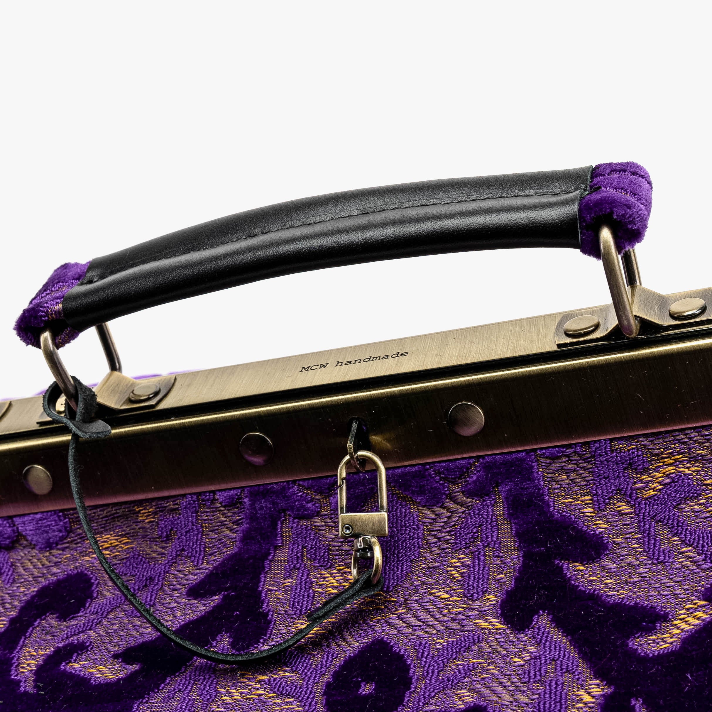 Burnout Velvet Purple Genevieve Carpet Gladstone Bag of America logo