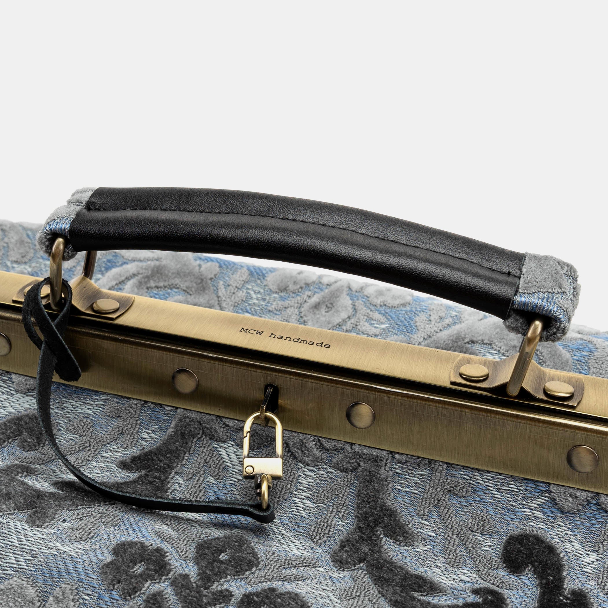 Burnout Velvet Steel Blue Genevieve Carpet Gladstone Bag of America logo