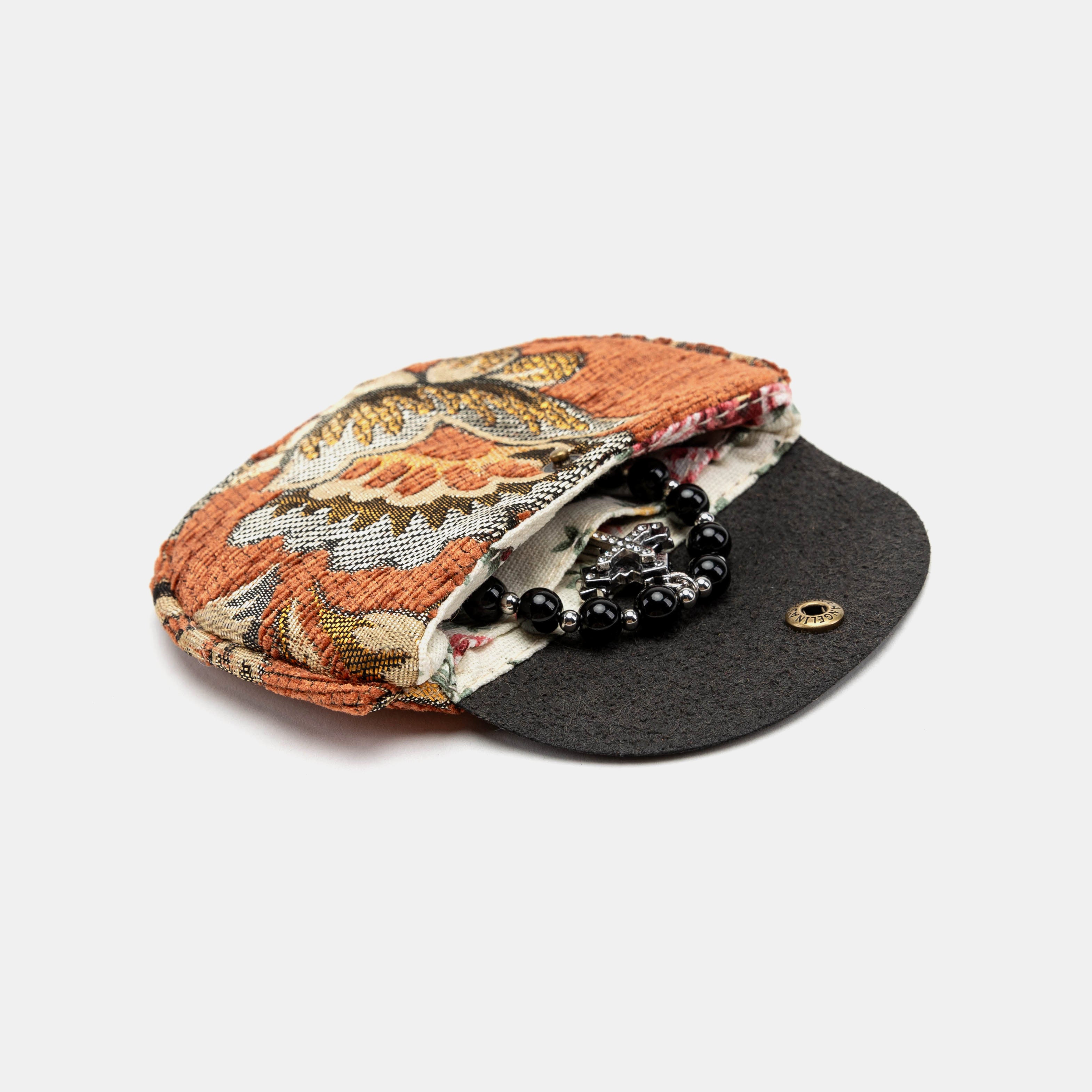 Paisley Orange Rosary Bag Carpetbag of America  in use