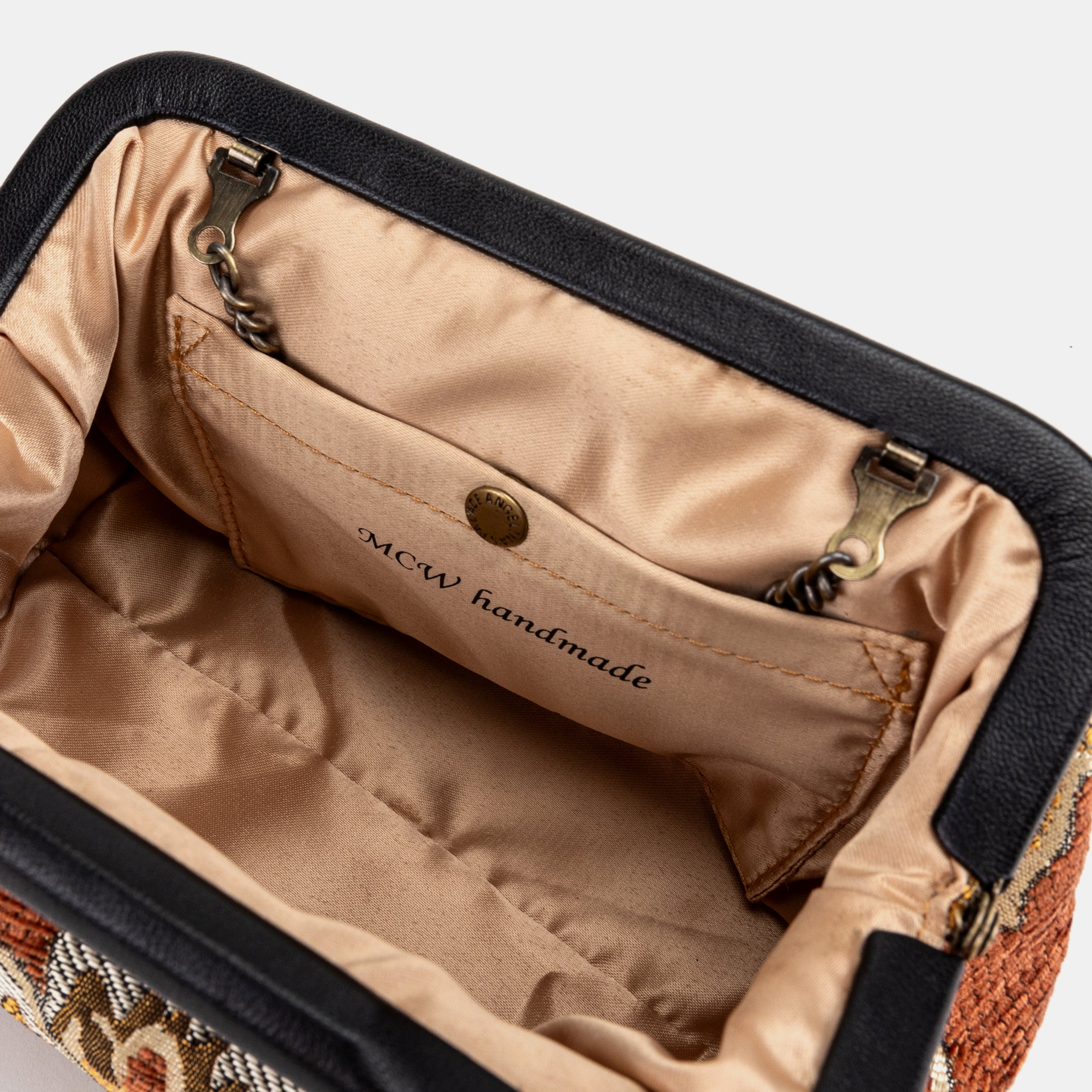 Floral Paisley Orange Evening Bag Clutch of America logo