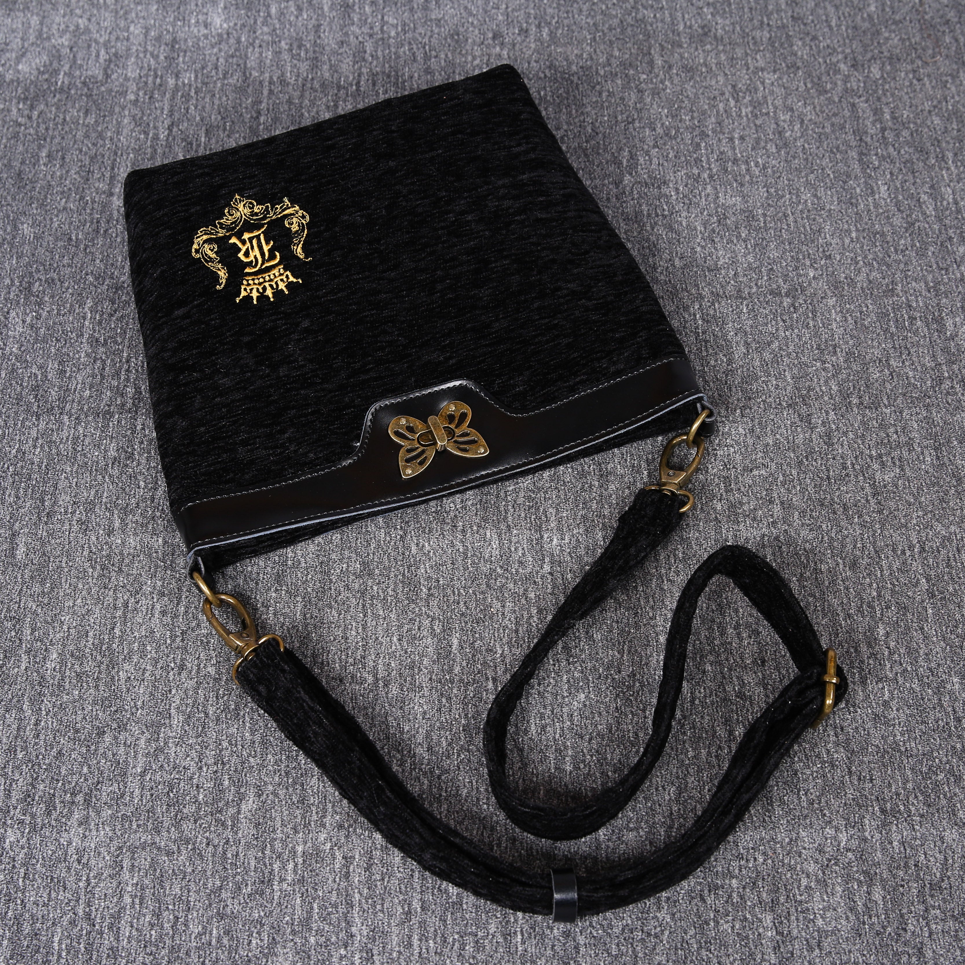 Luxury Monogrammed Black Butterfly Crossbody Bag (Logo) of America lay flat