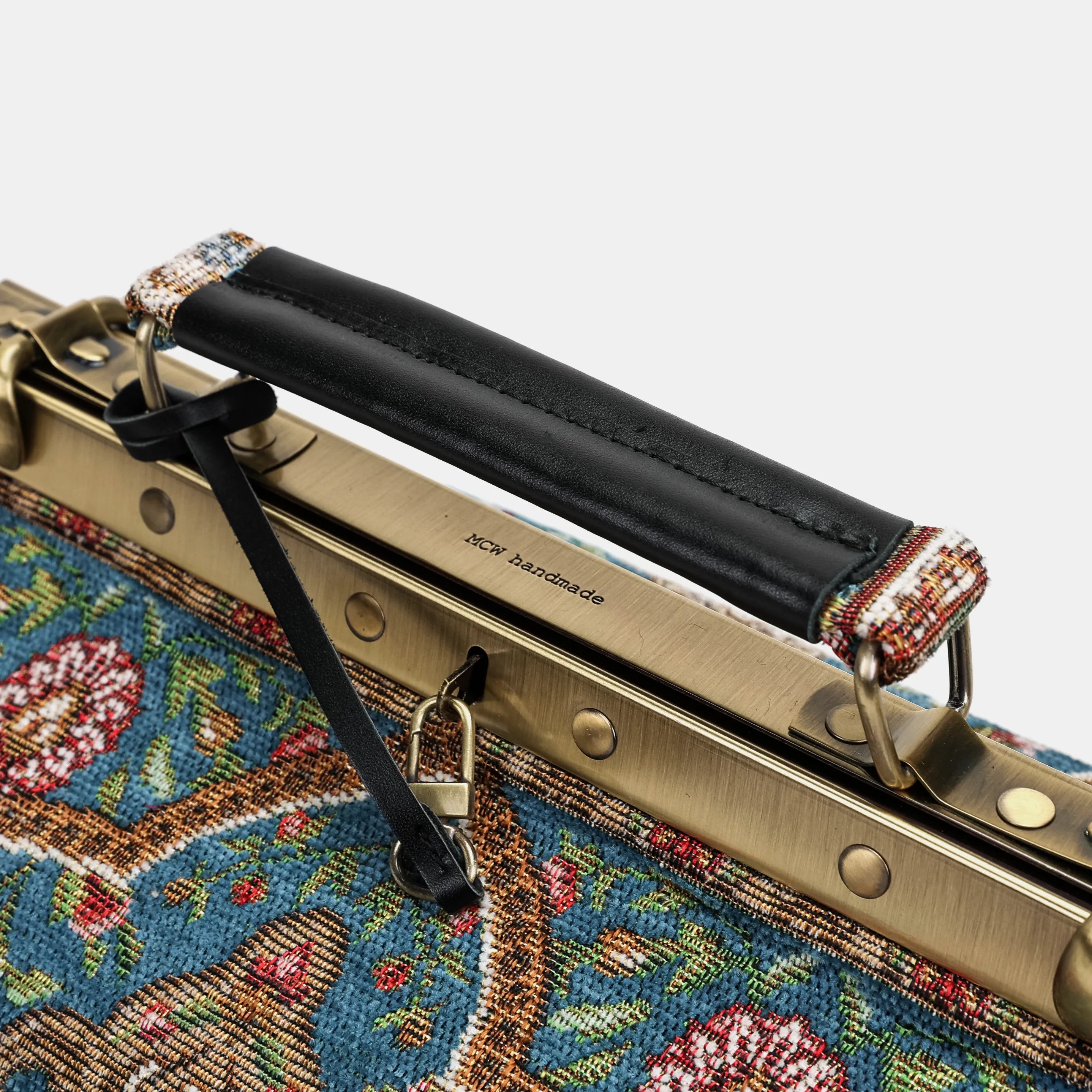 Oriental Blue Vivienne Carpet Purse Gladstone Bag of America logo