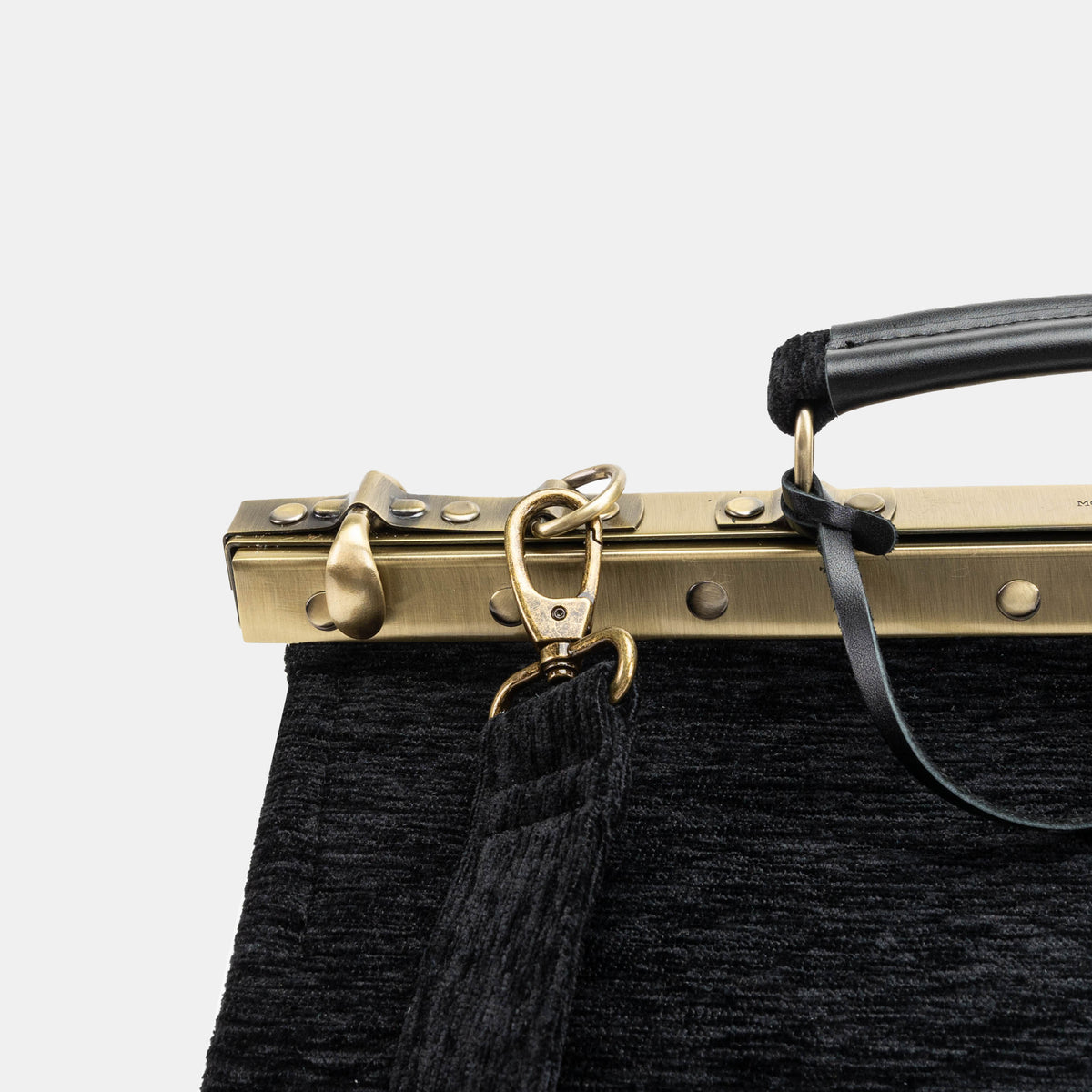 Solid Black Genevieve Carpet Gladstone Bag of America shoulder strap clasp