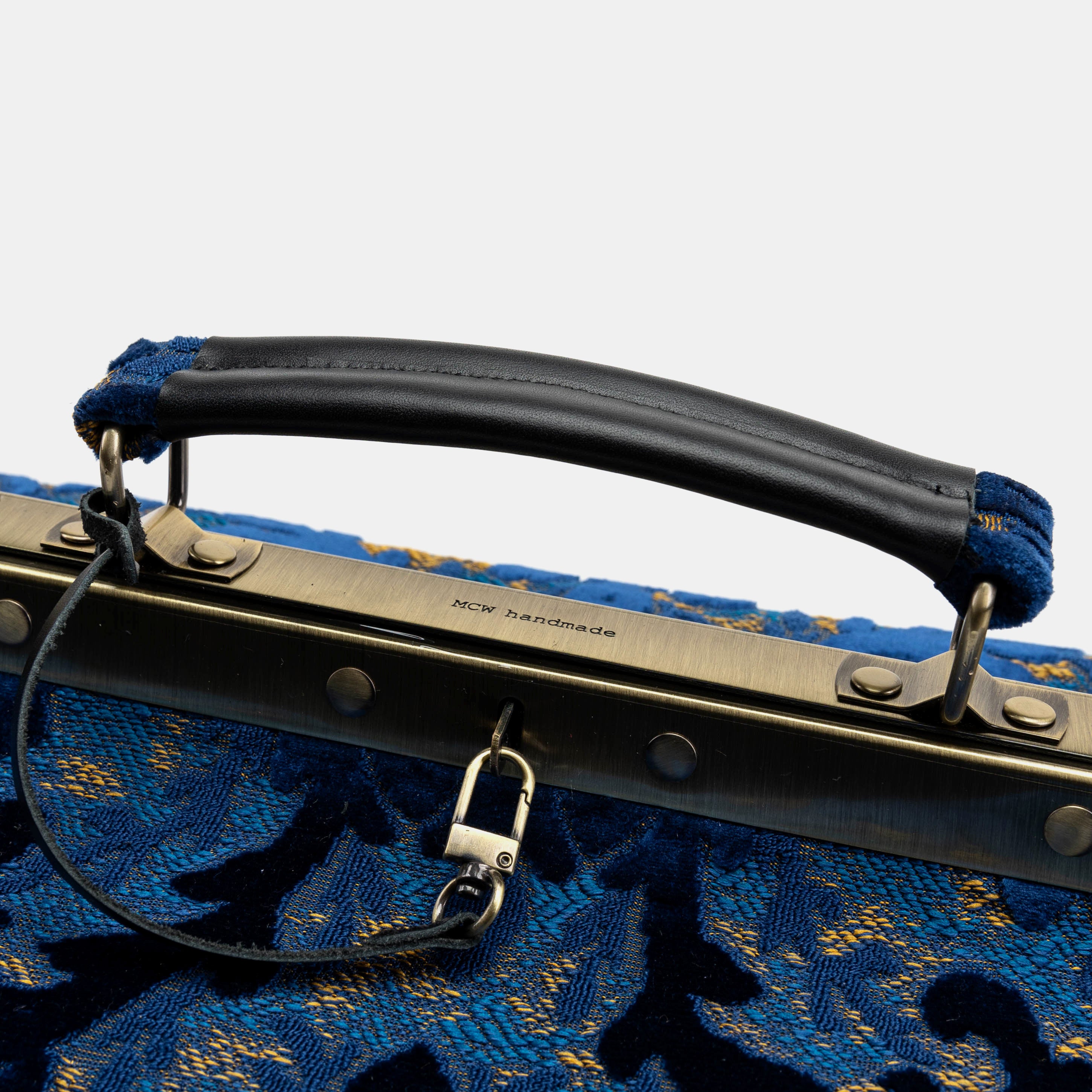 Burnout Velvet Navy Genevieve Carpet Gladstone Bag logo