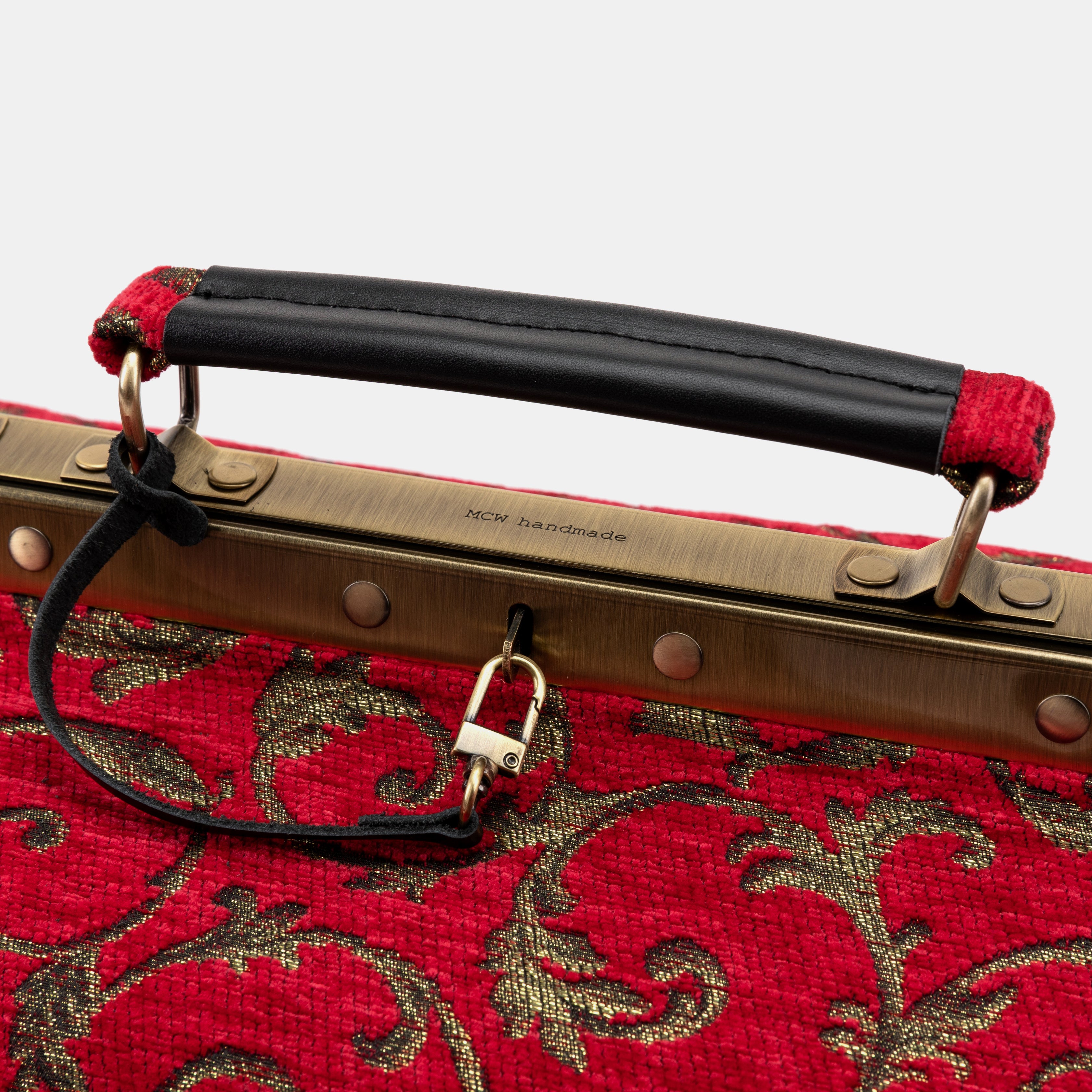 Vintage Scroll Red Genevieve Carpet Gladstone Bag of America logo