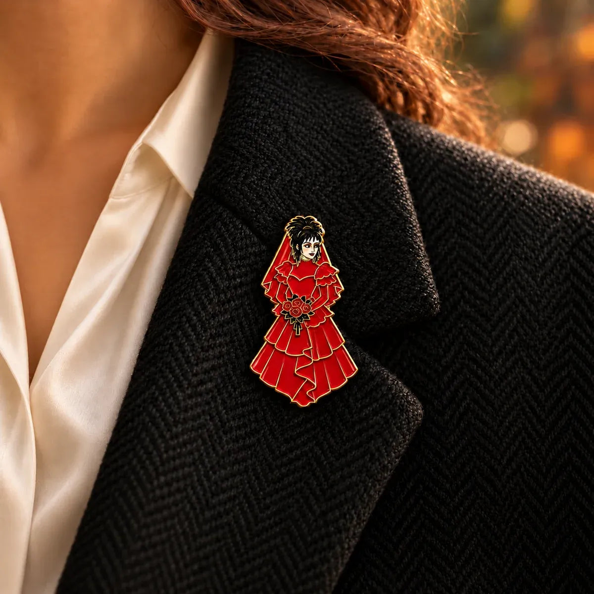 Lydia in Red Beetlejuice enamel brooch on black tweet jacket