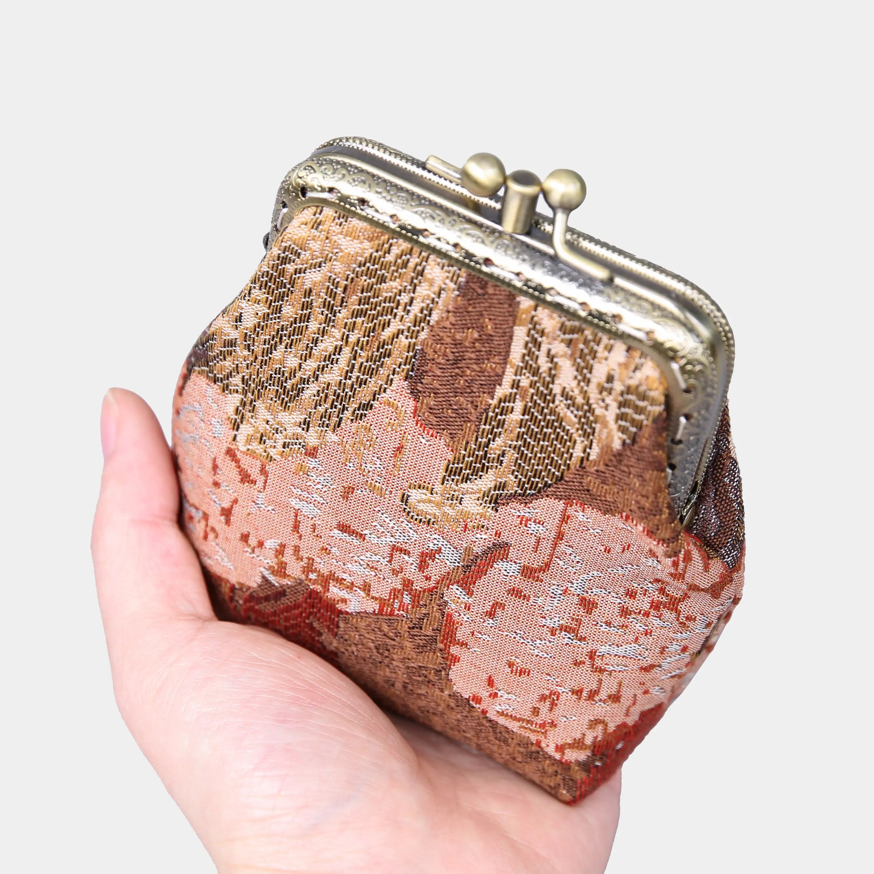 Abstract Brown Double Kiss Clasp Coin Purse of America in the hand-1