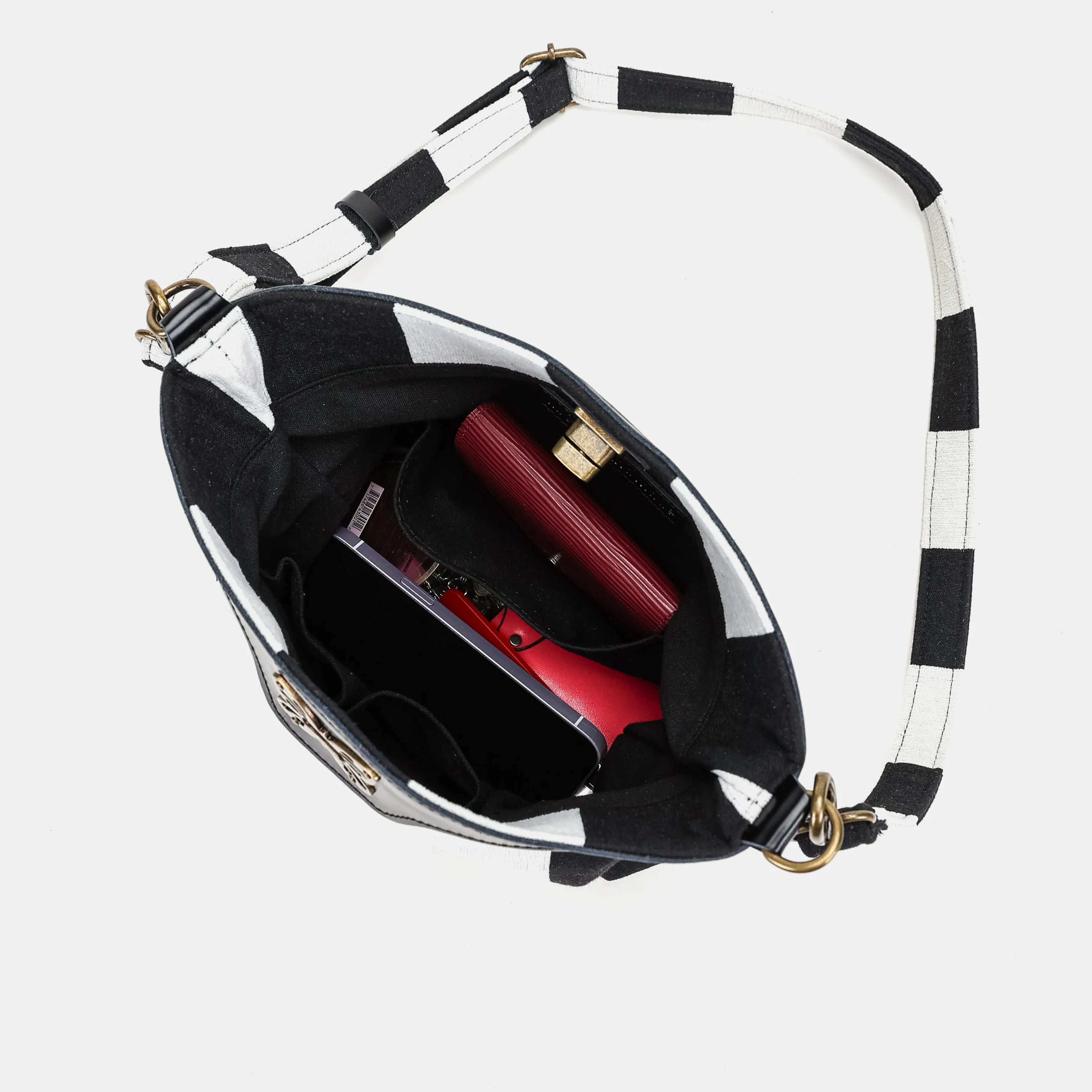 Black & White Beetlejuice Crossbody Carpet Bag of America in use