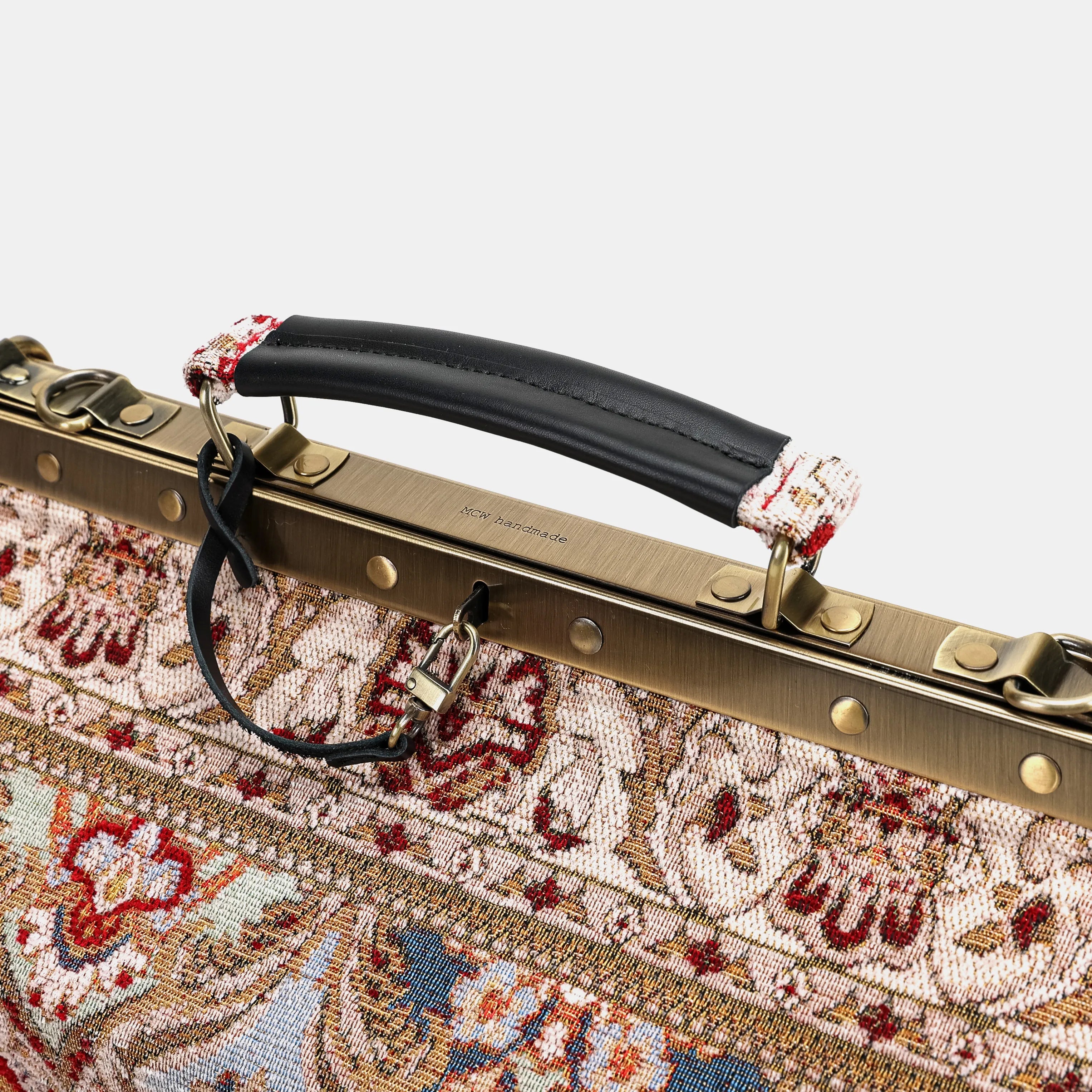 Golden Age Red Genevieve Carpet Gladstone Bag of America logo