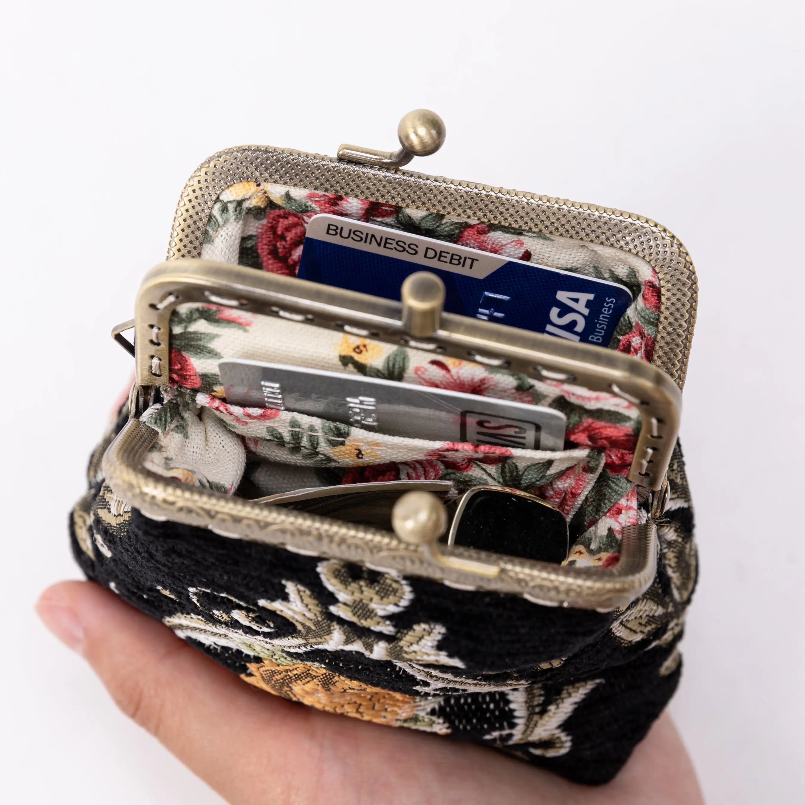 Eternal Elegance Black Double Kiss Clasp Coin Purse of America in use-3