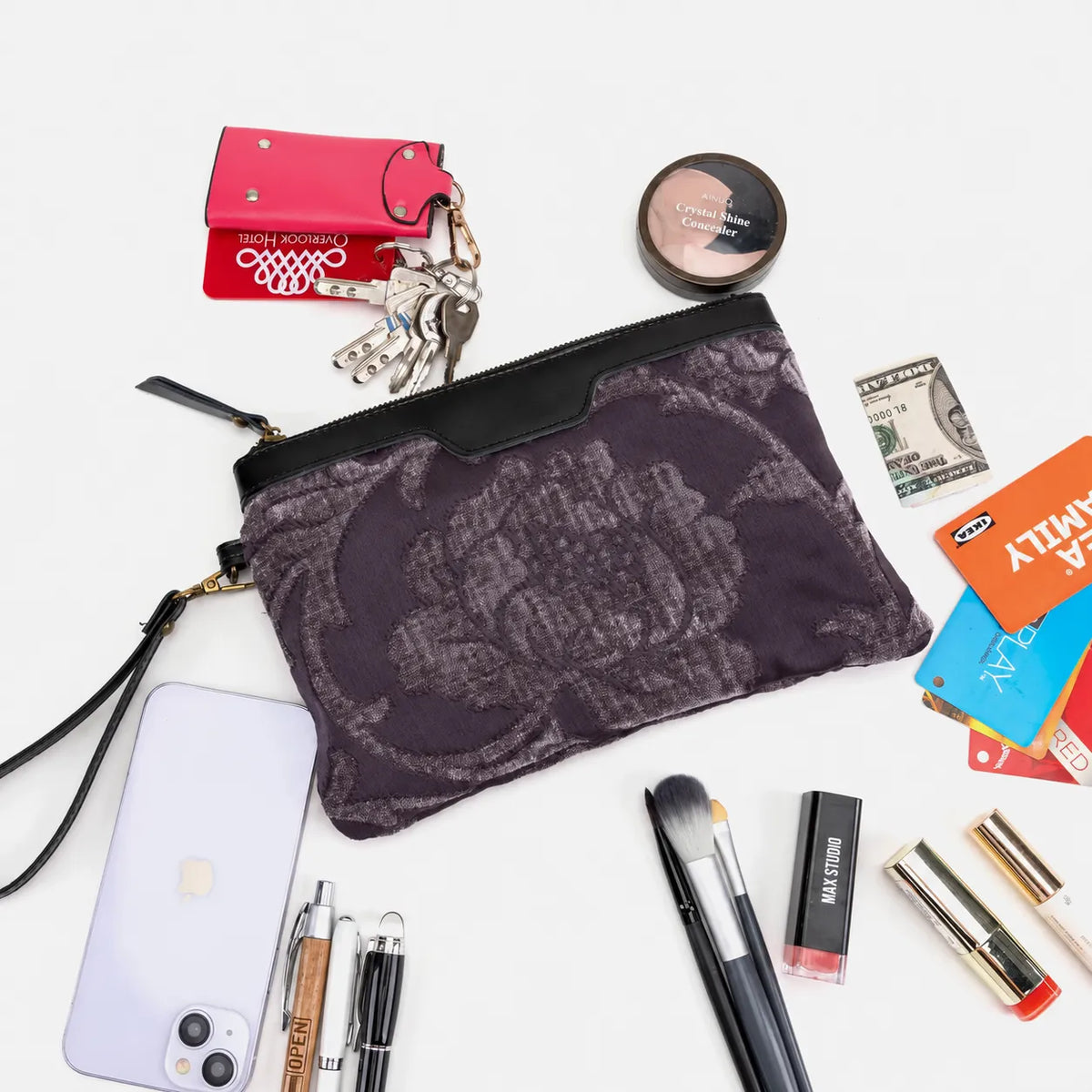 Wristlet Clutch Carpet Bag | Floral Brocade Purple in use