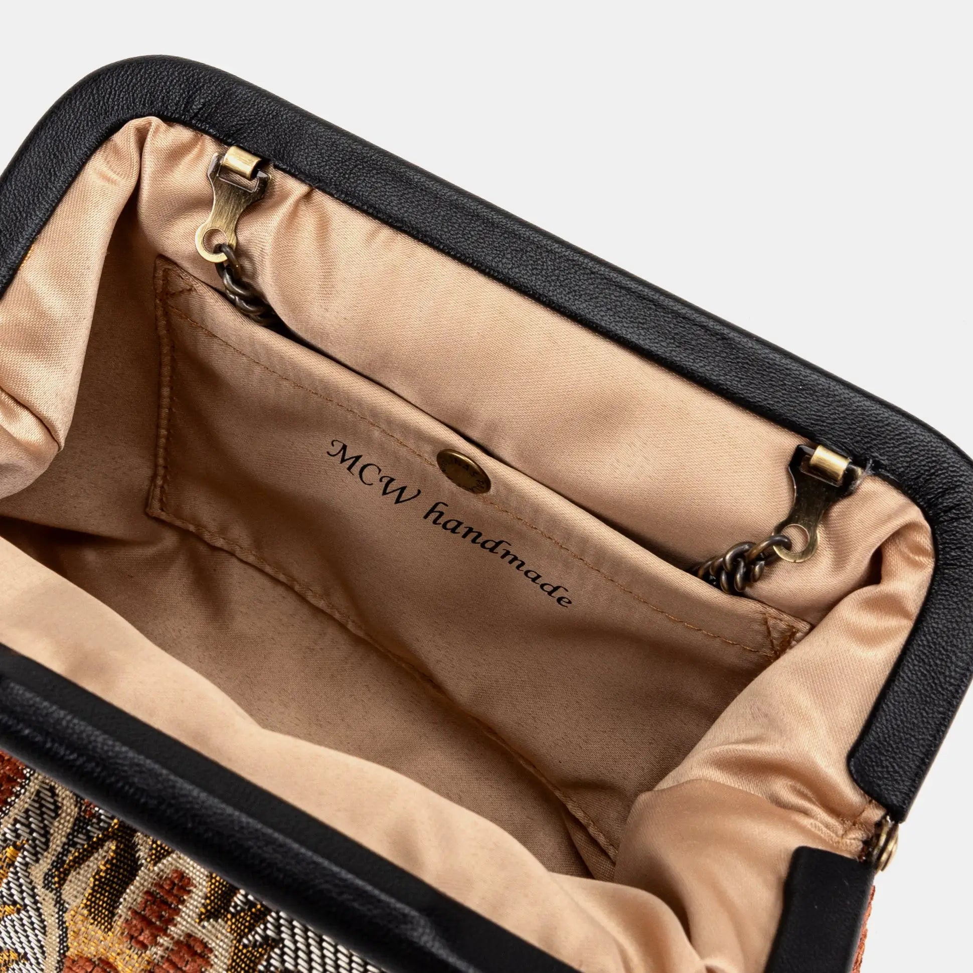 Floral Paisley Orange Alma Clutch of America logo