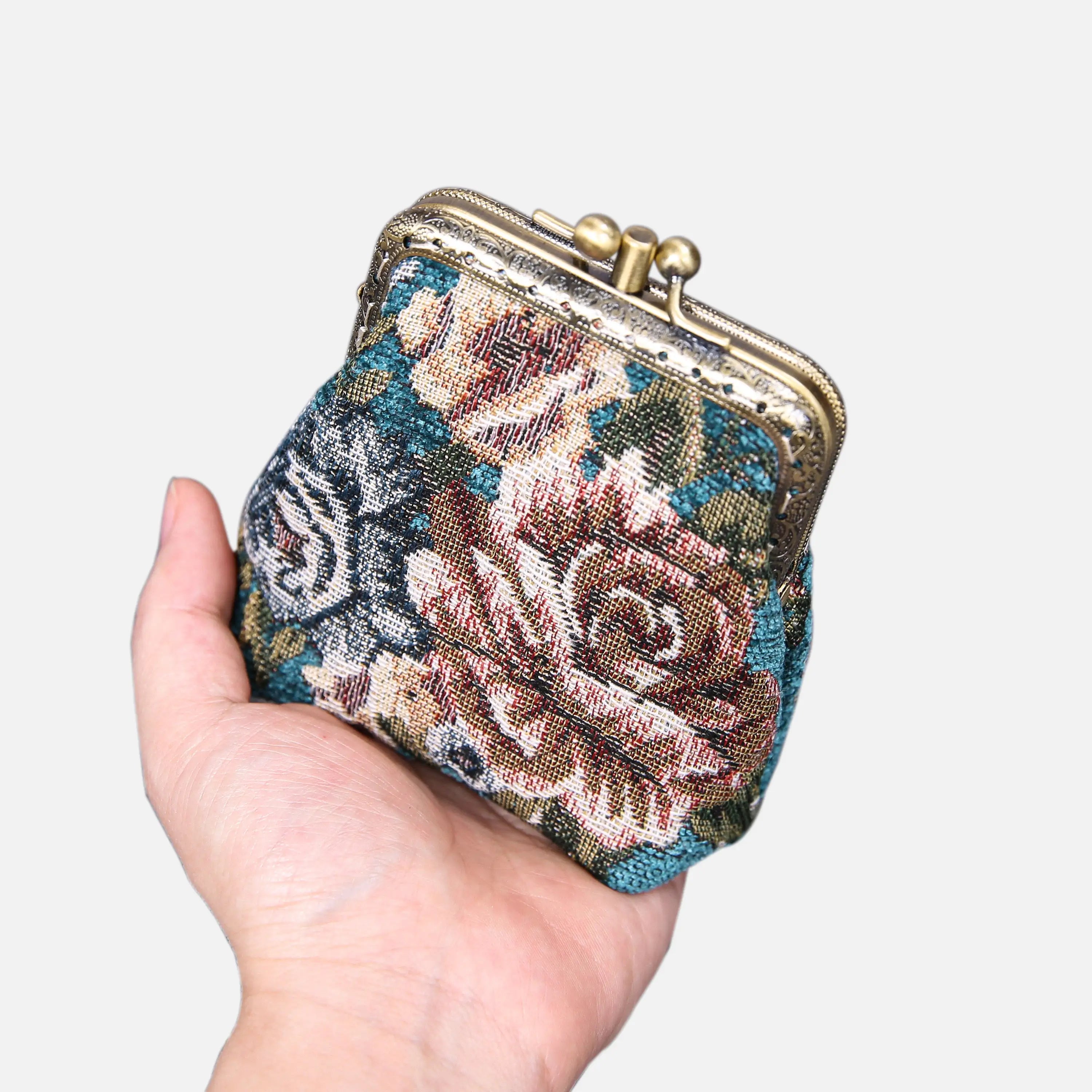 Floral Teal Double Kiss Clasp Coin Purse of America in the hand-5