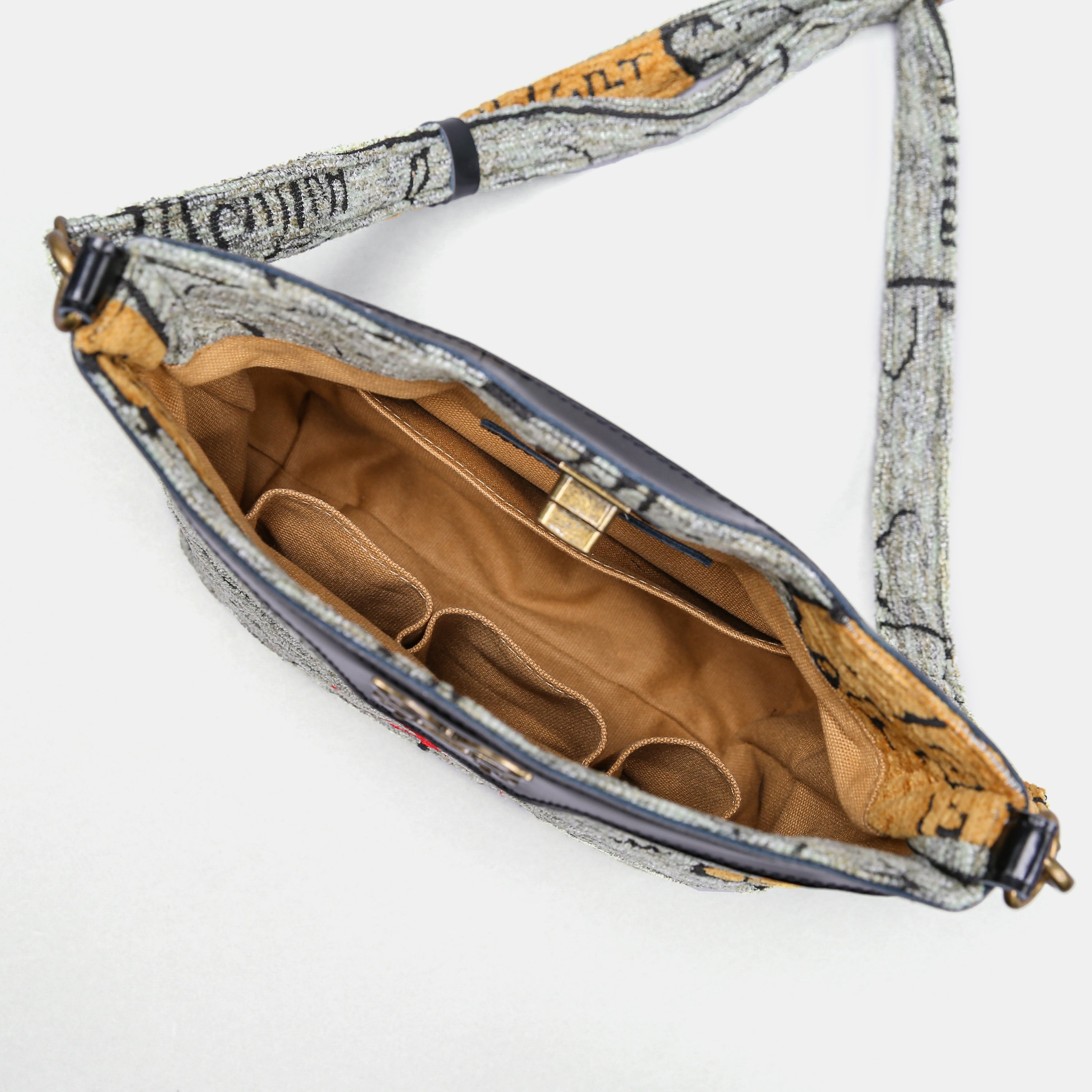 Here Be Dragons Butterfly Crossbody Bag Carpetbag of America inside
