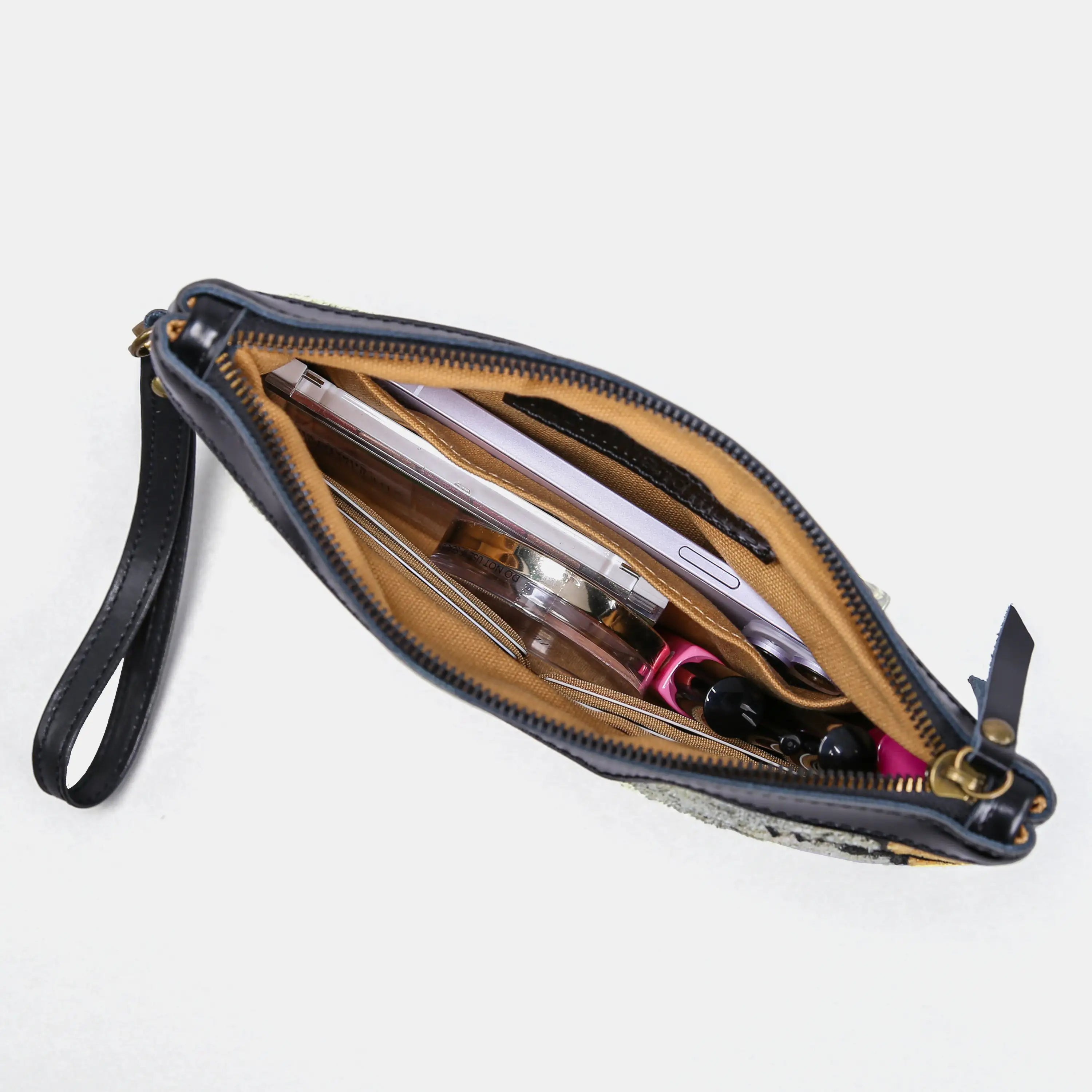 Here Be Dragons Wristlet Clutch Carpetbag of America in use