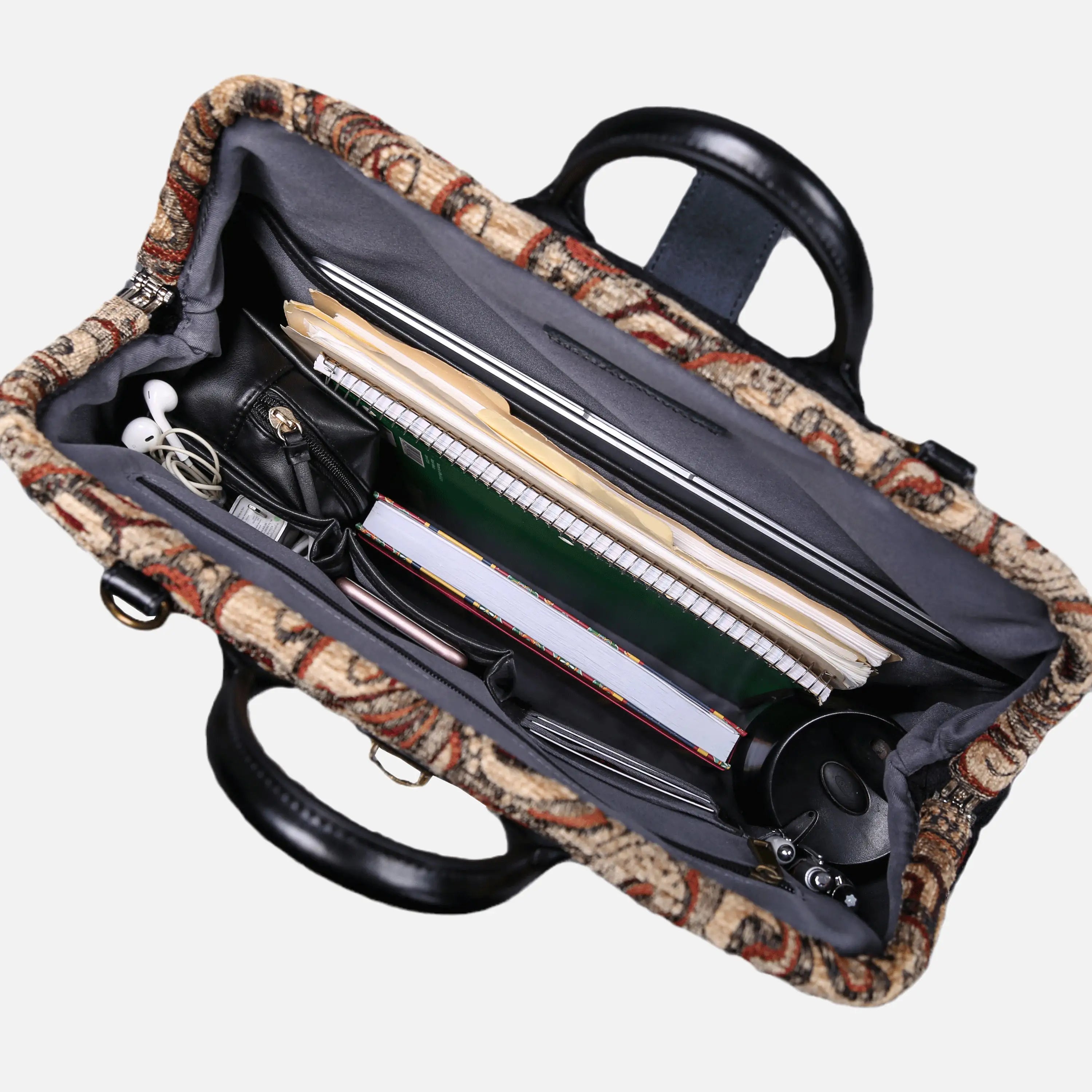 Paisley Brown carpet bag of America in use