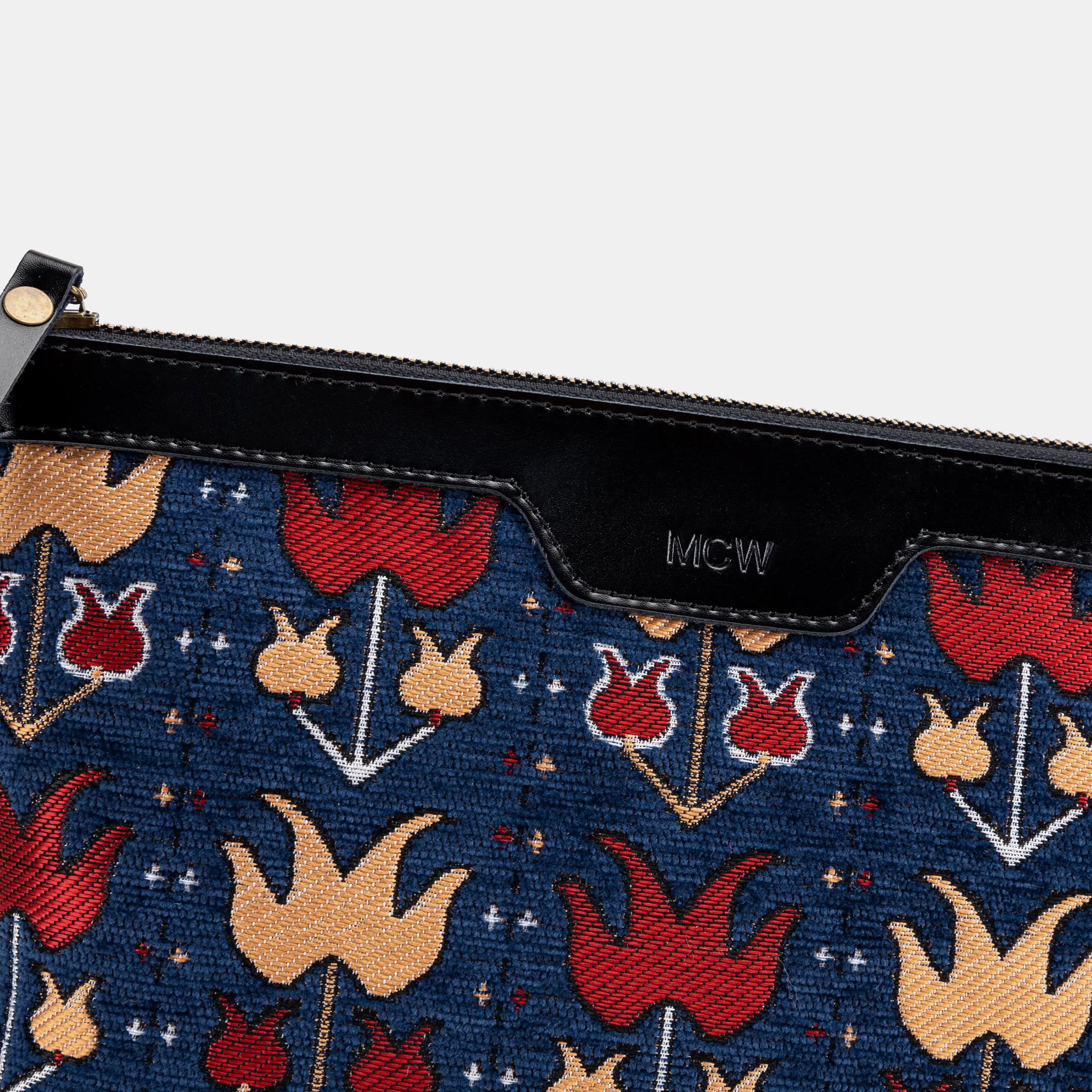 Poppy Bloom Carpet Makeup Bag Carpetbag of America logo