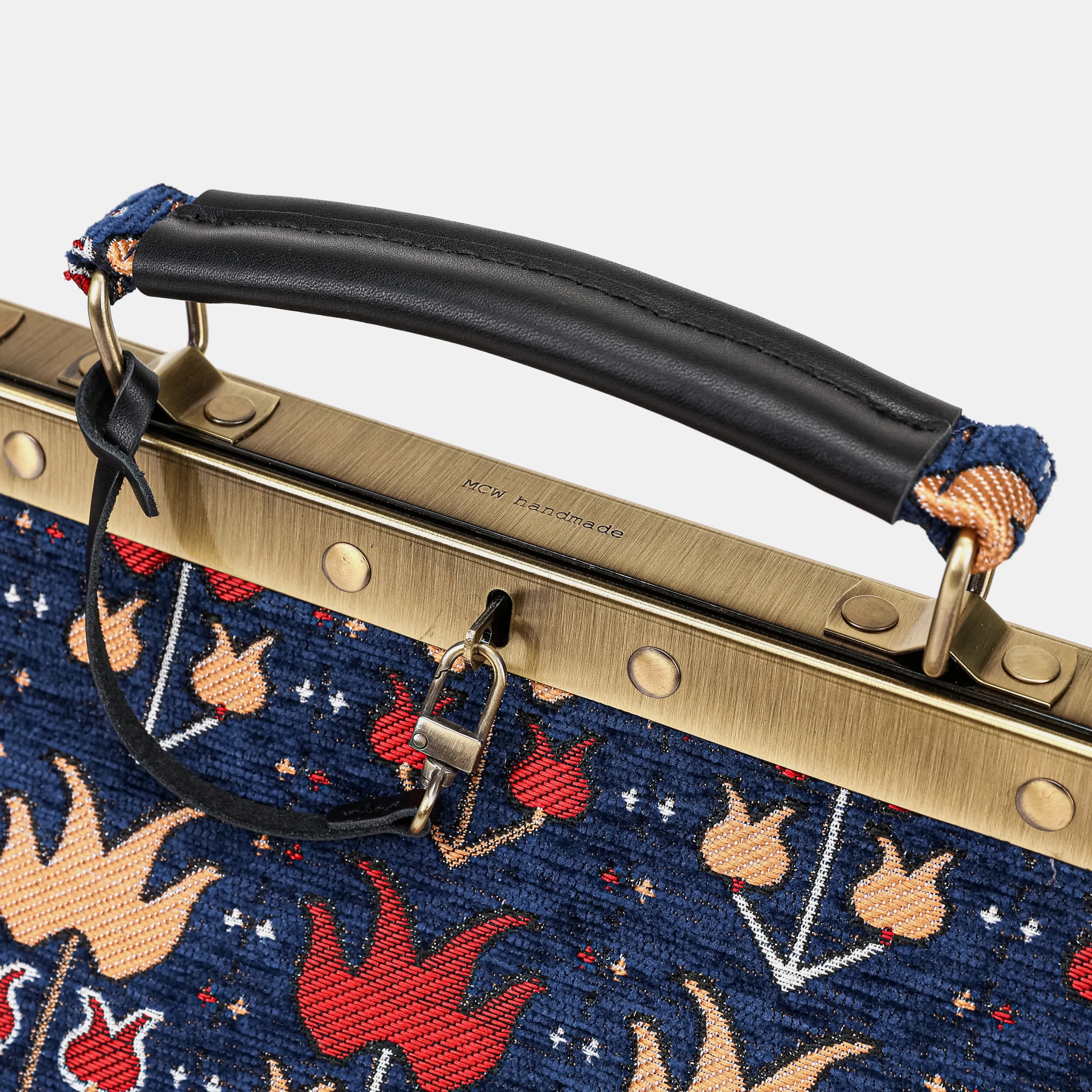 Poppy Bloom Celine Carpet Gladstone Bag of America  logo