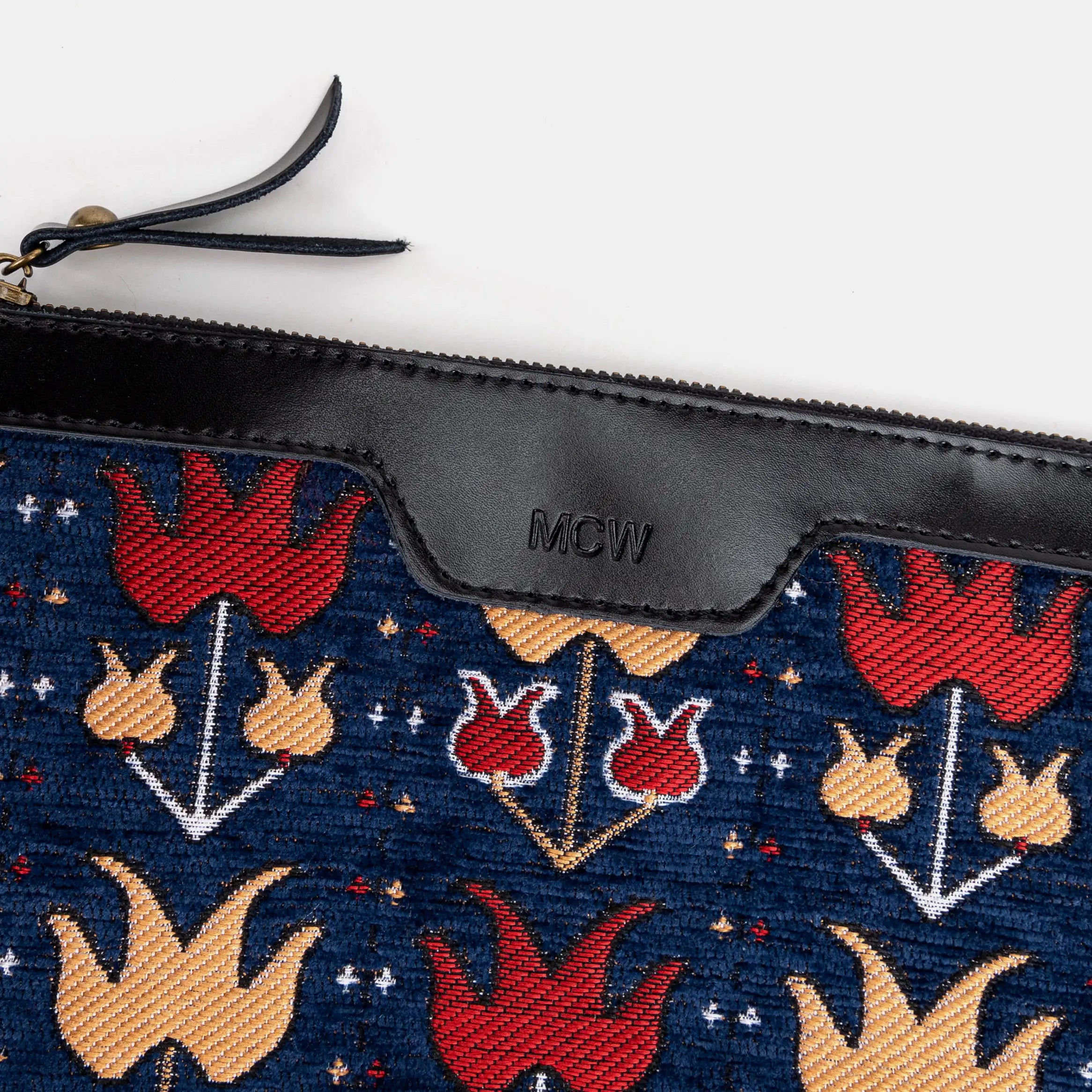 Poppy Bloom Wristlet Clutch Carpetbag of America logo