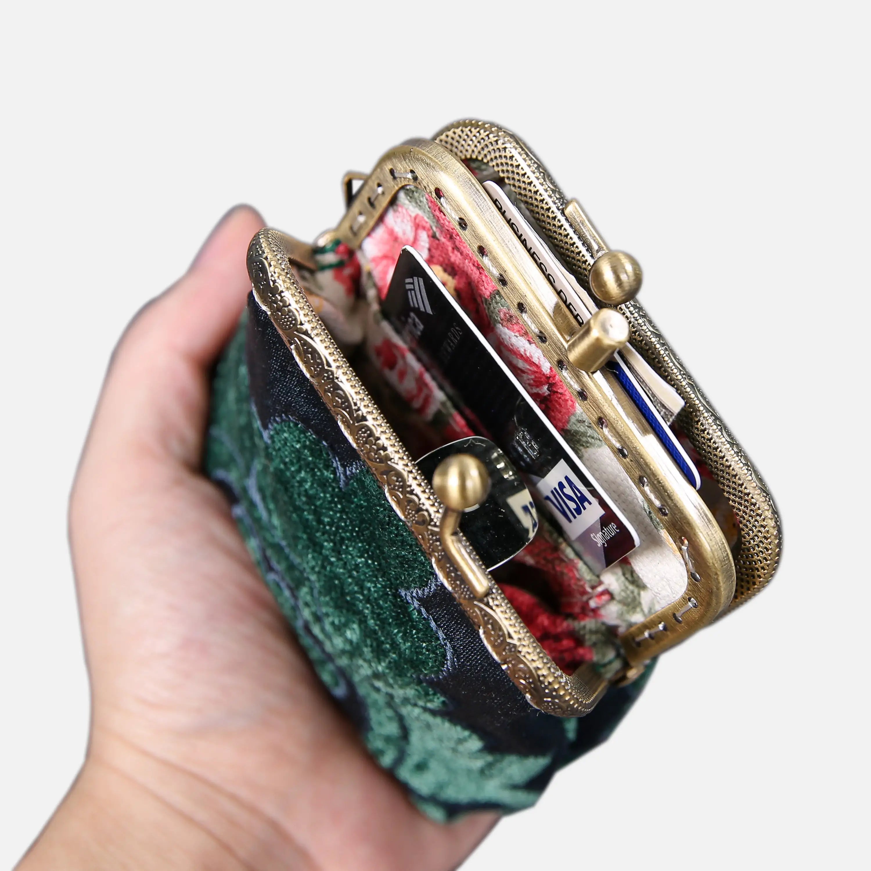 Queen Hunter Green Double Kiss Clasp Coin Purse of America in use-1