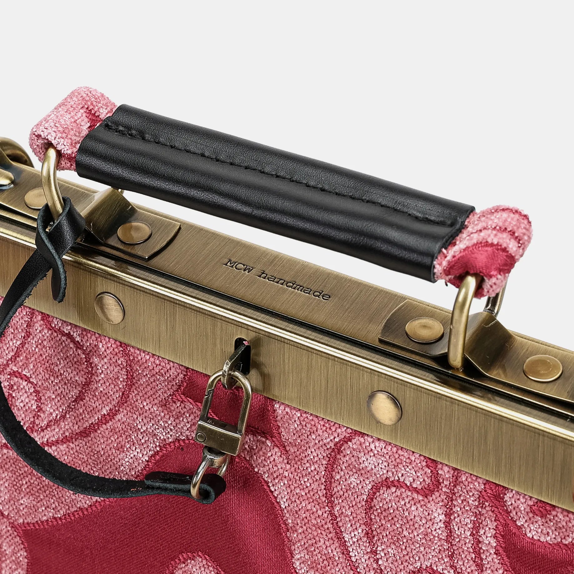 Queen Rose Pink Helena Carpet Gladstone Backpack of America logo