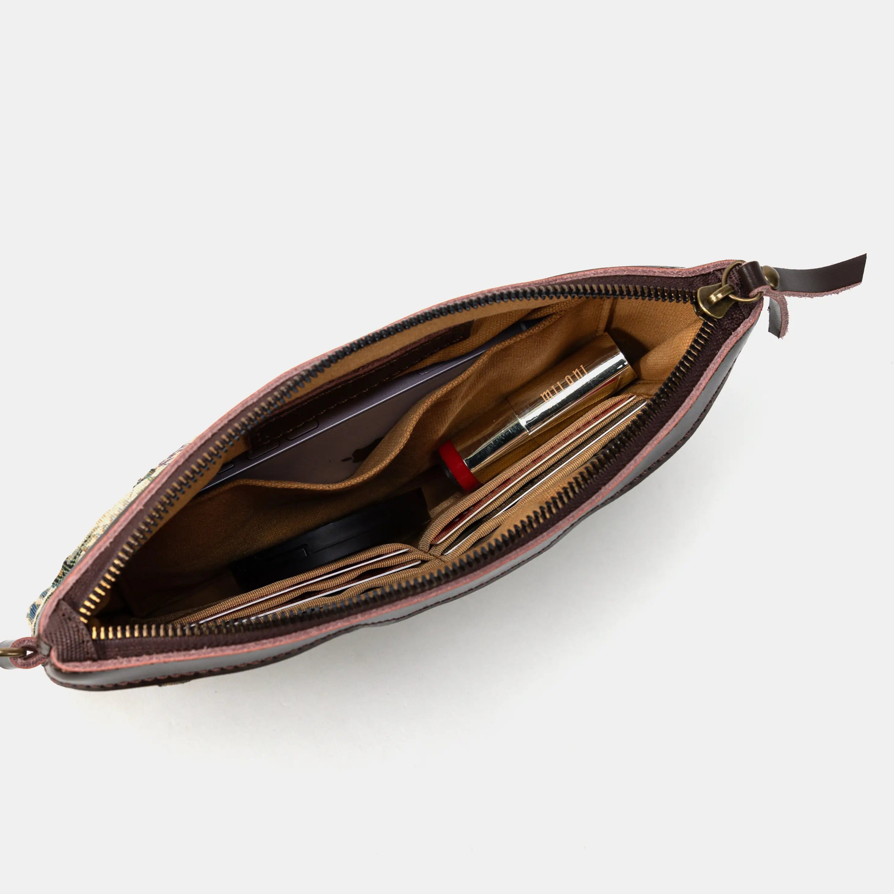 Spring Valley Mint Wristlet Clutch inside filled