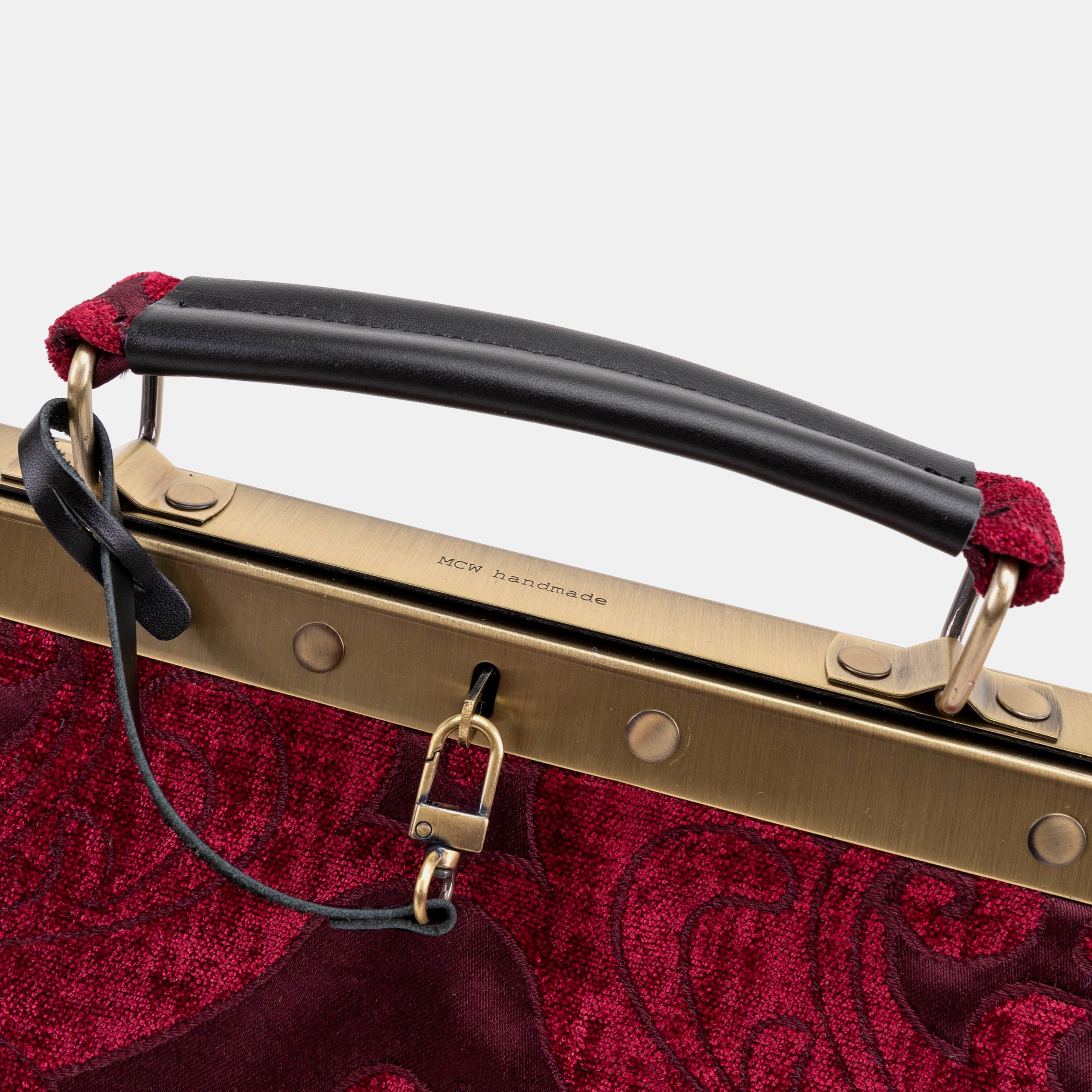Queen Wine Celine Carpet Gladstone Bag of America logo