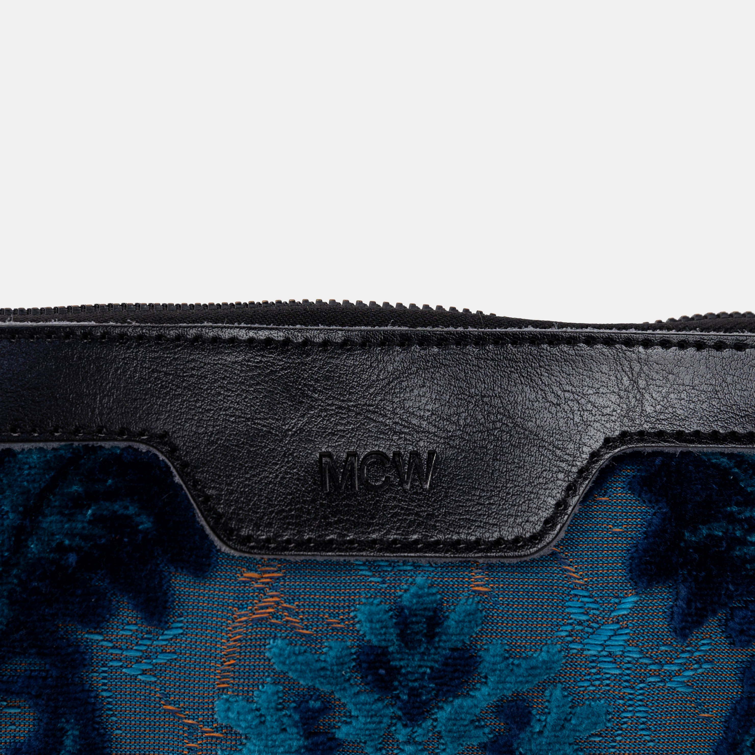 Burnout Velvet Revival Aqua Carpet Makeup Bag logo