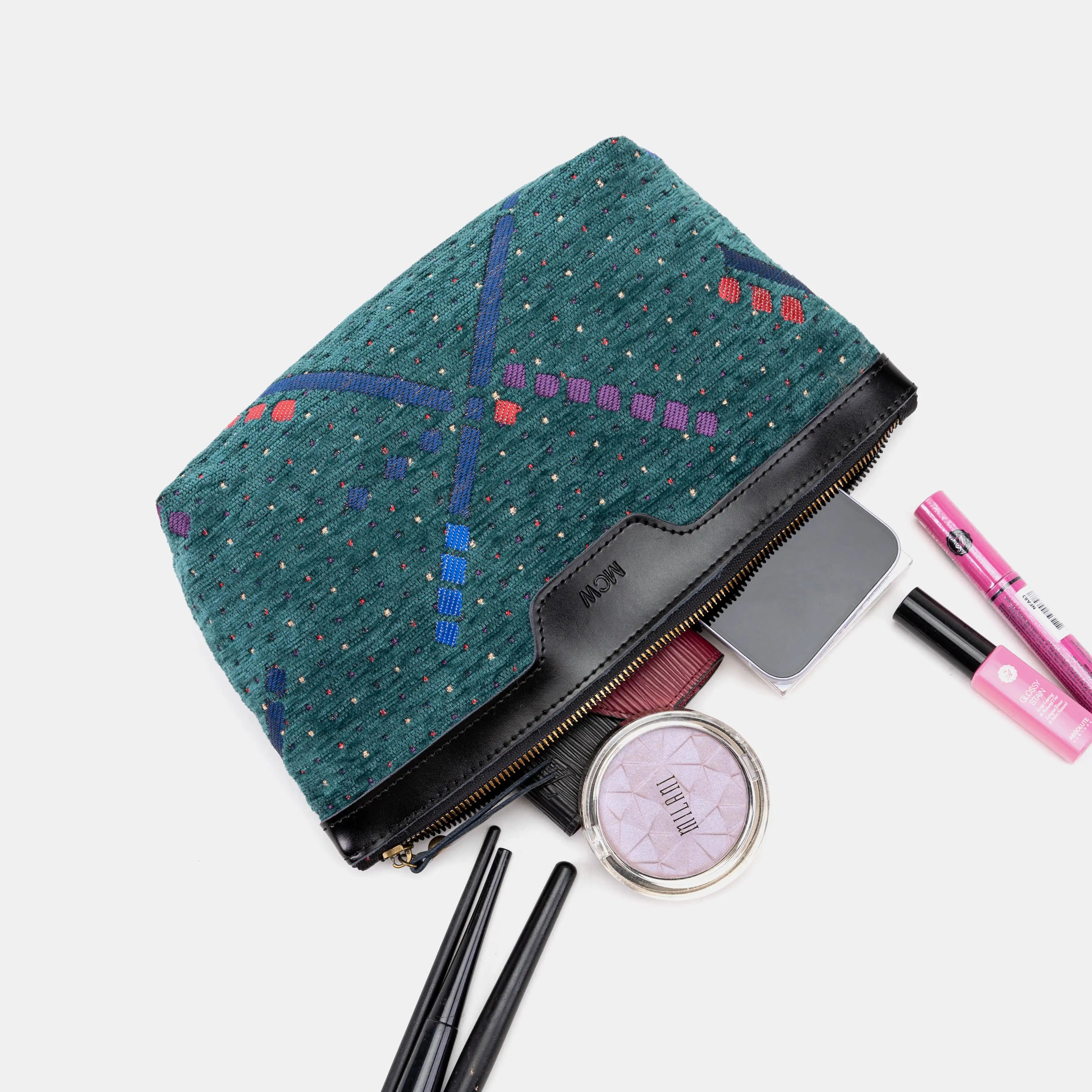 PDX Portland Airport Carpet Makeup Bag of America in use